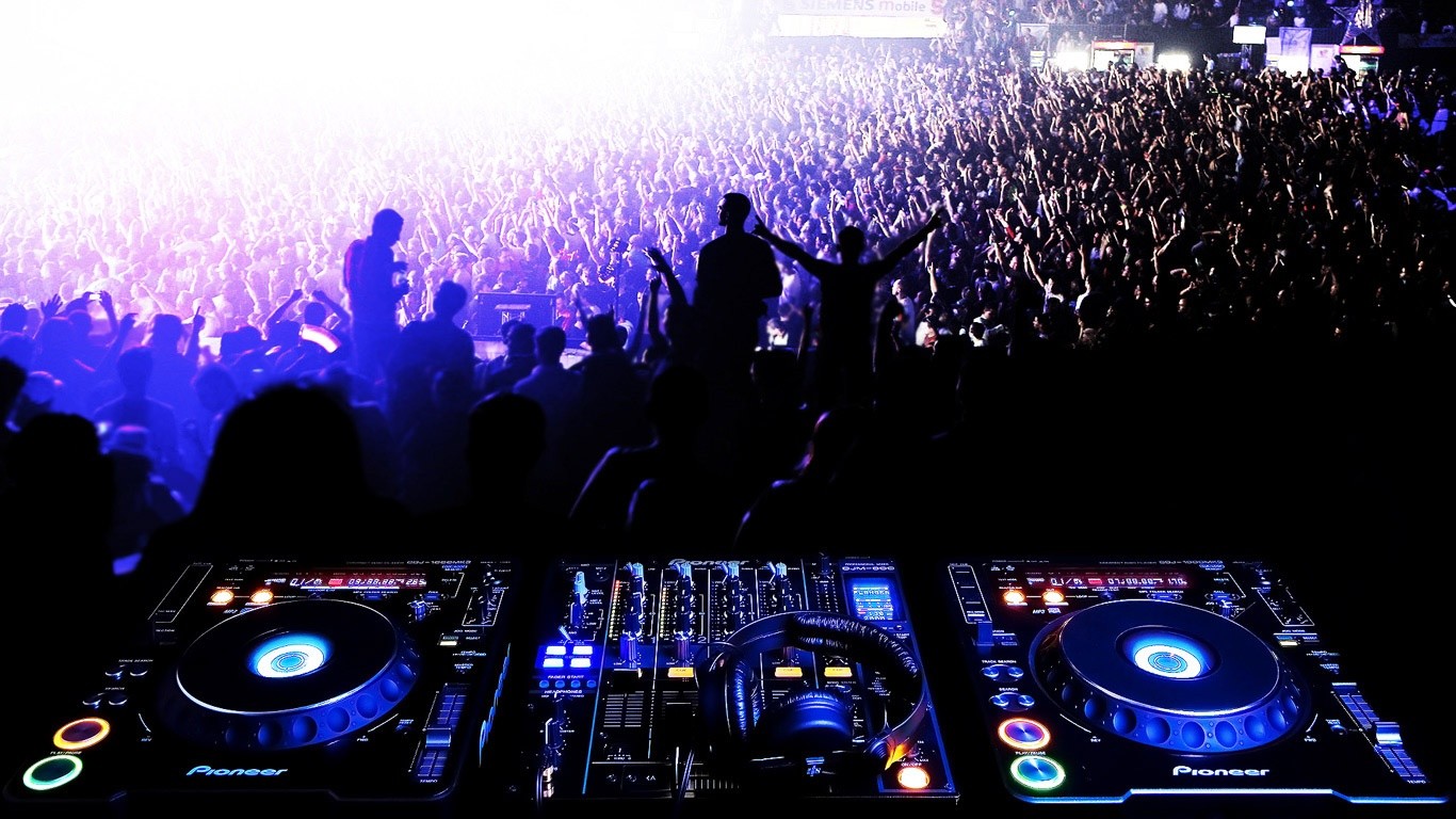 dj mixing console at stadium